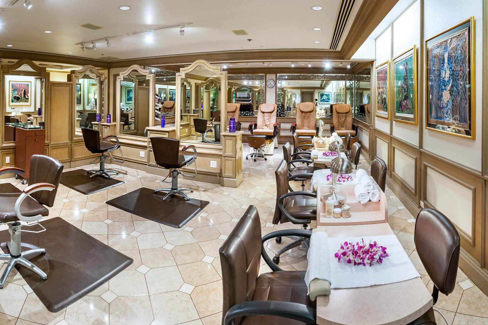 interior view of spa grande services area, with salon chairs and esthetics seating