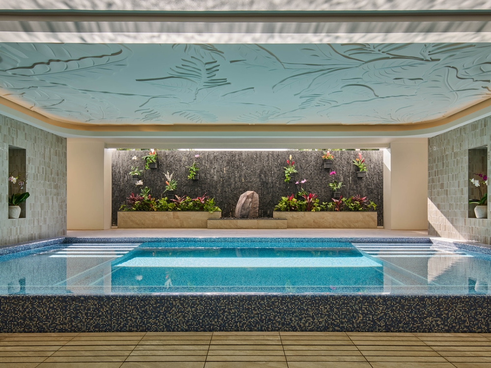 The Kilolani Spa Vitality Pool, with vibrant blue water in a calm, inviting setting.