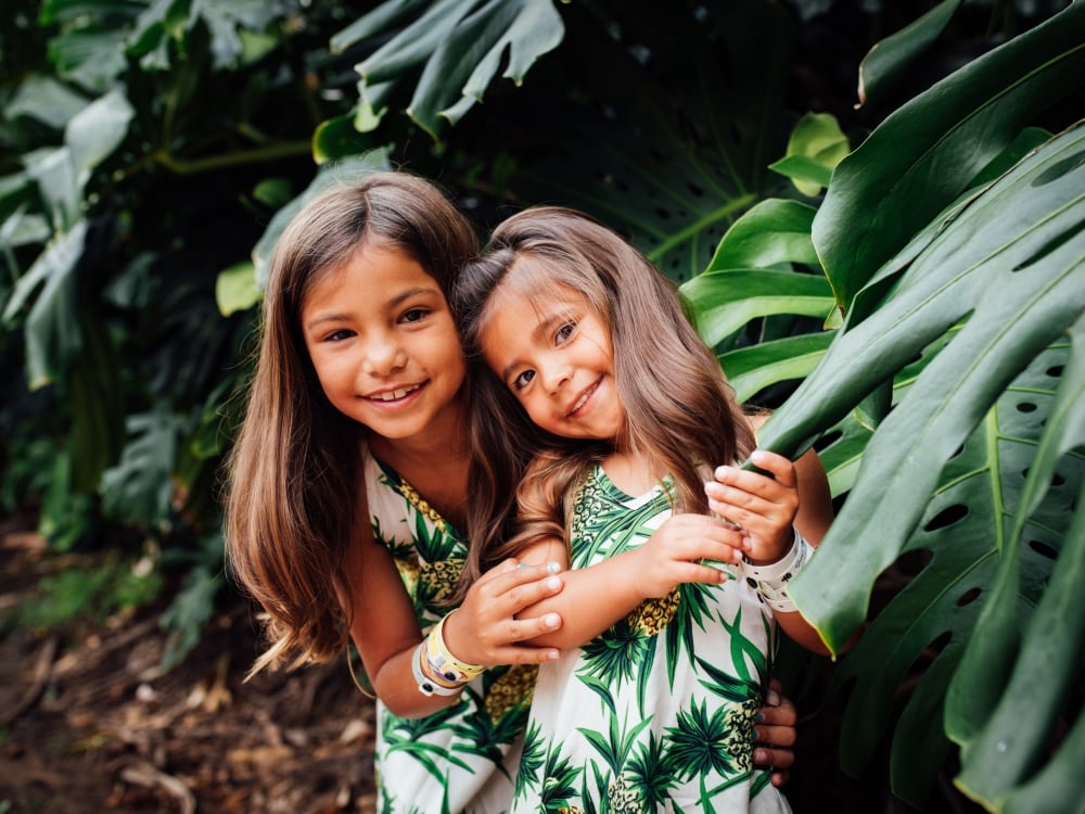 Two girls smiling 