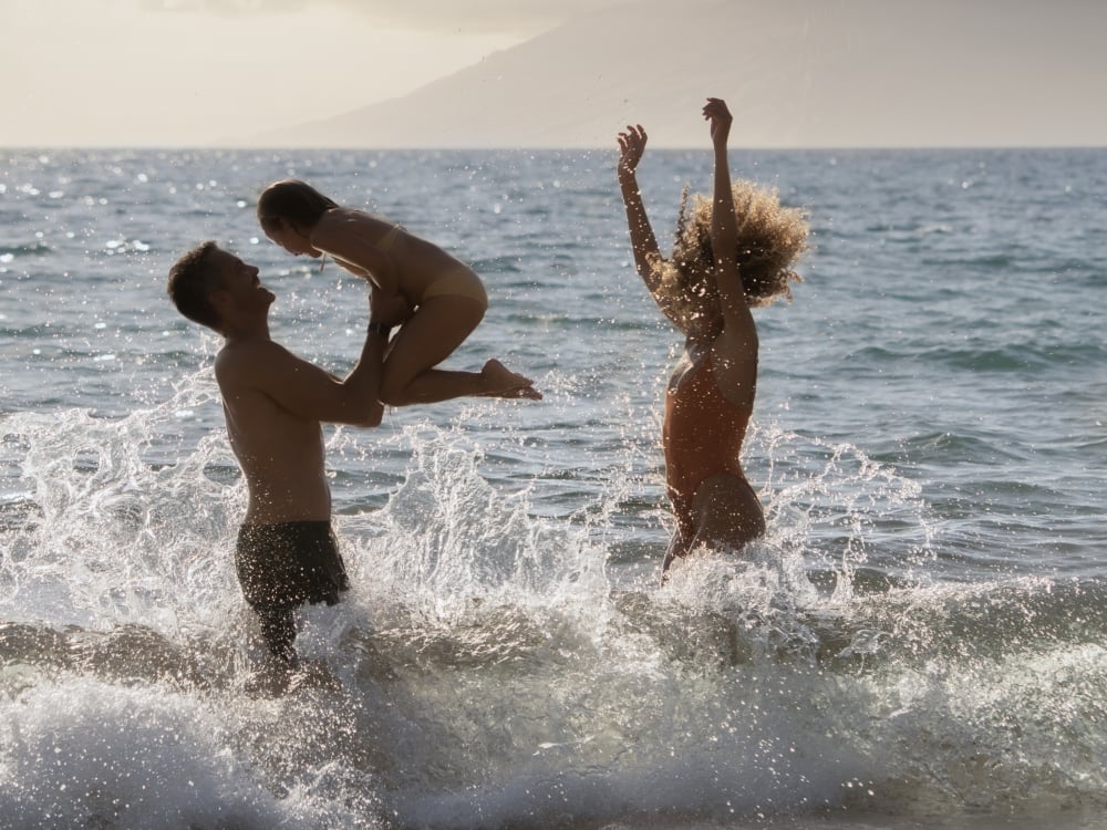 A family playing in the sea