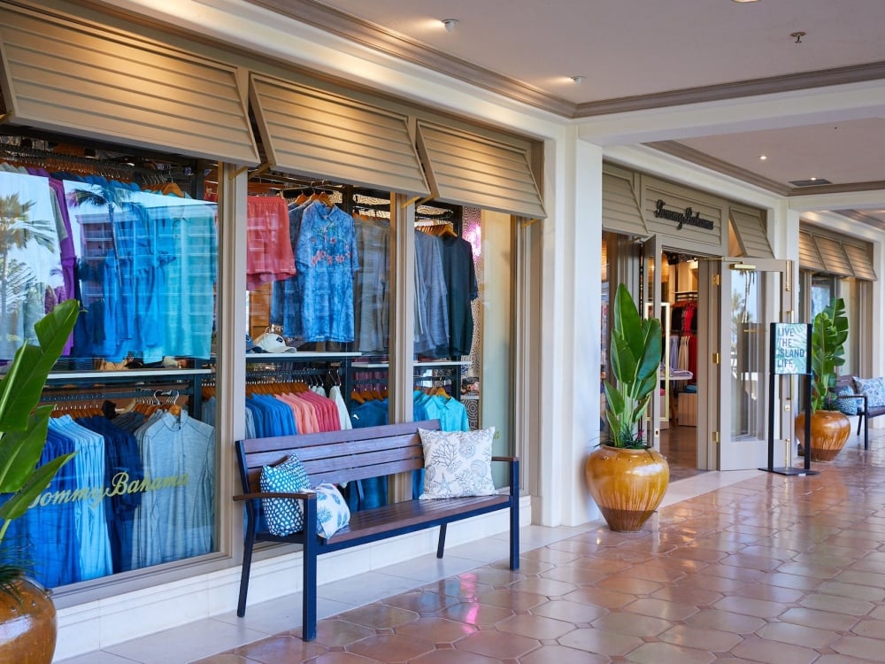 A row of shop windows with merchandise visible