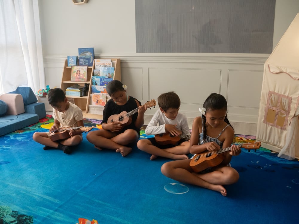 kids playing ukulele