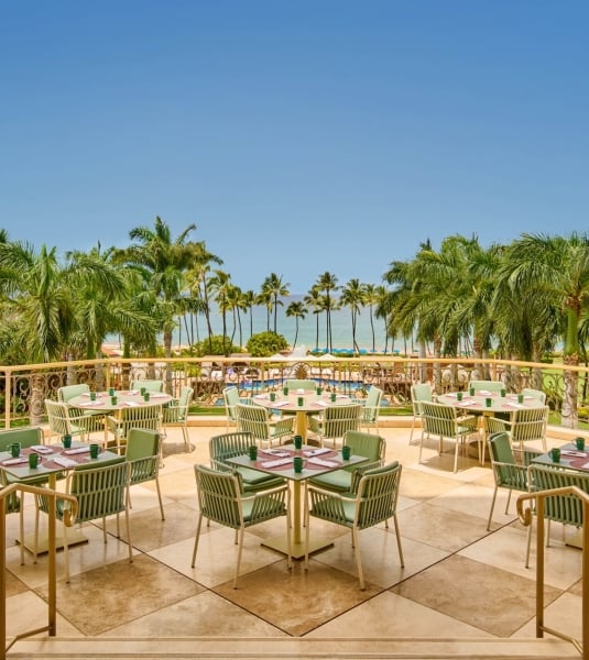 A dining terrace look out on the ocean