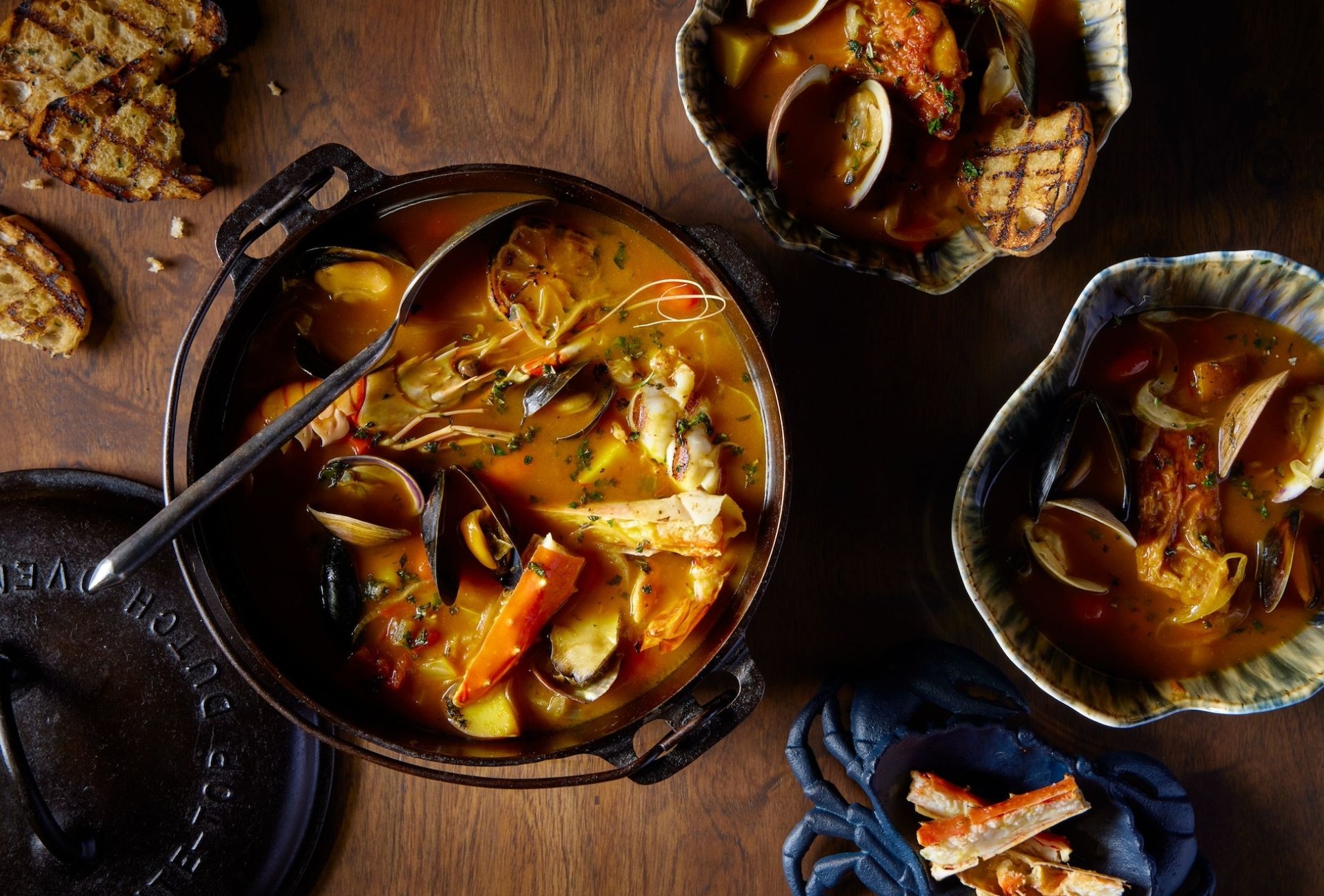 Several bowls of seafood stew