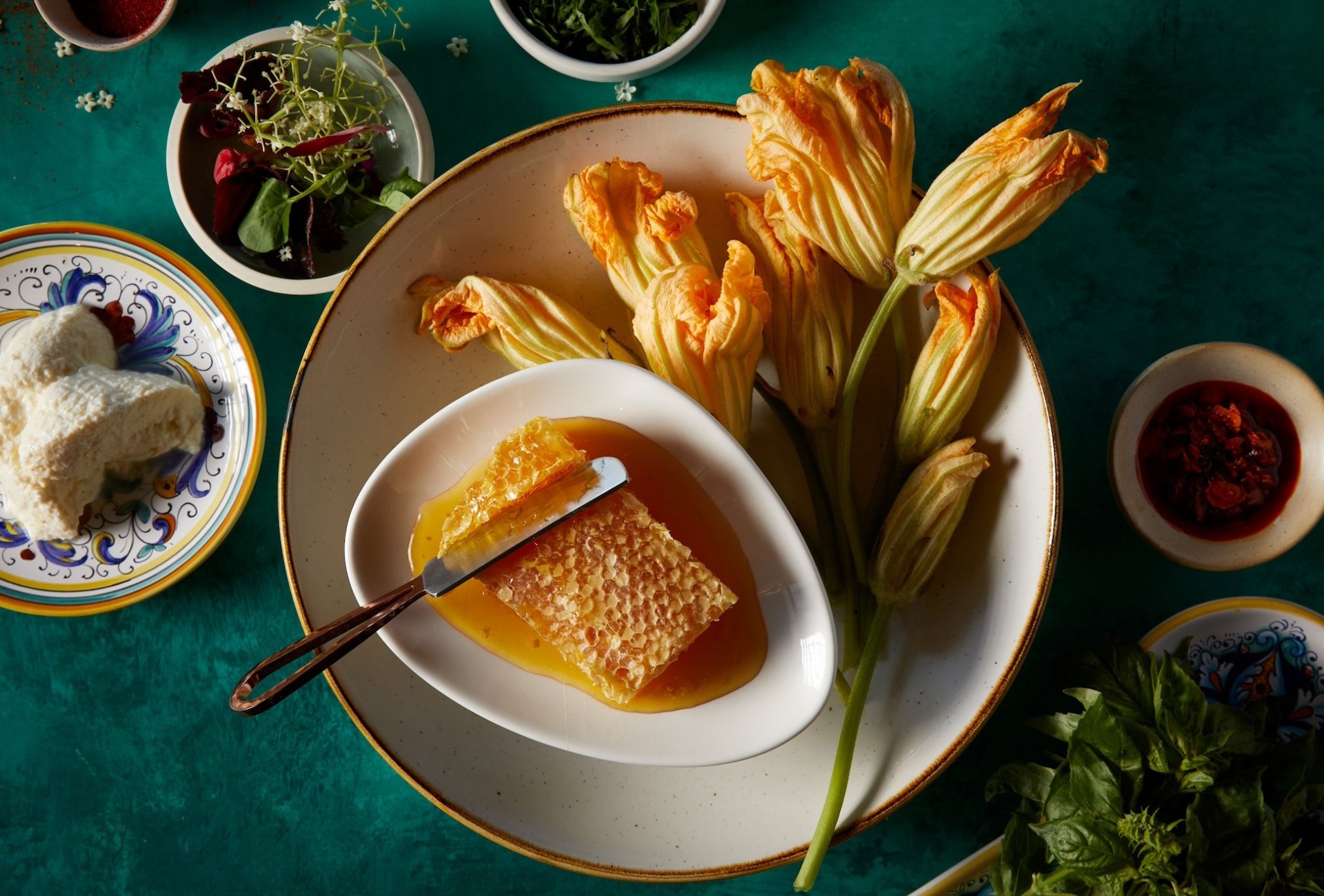 An elegant dish featuring a honeycomb and flowers